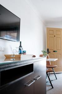 a kitchen with a sink and a counter at Alexandra Place in Bendigo