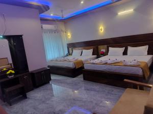Sami Resort tesisinde bir odada yatak veya yataklar