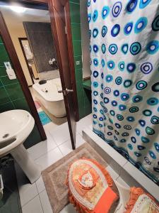 Koupelna v ubytování TURI Suite con Jacuzzi, centro de la ciudad