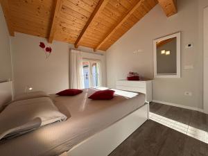 Postel nebo postele na pokoji v ubytování Ca' Ben Dongo - Larihome A53