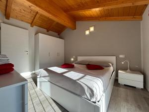 Postel nebo postele na pokoji v ubytování Ca' Ben Dongo - Larihome A53