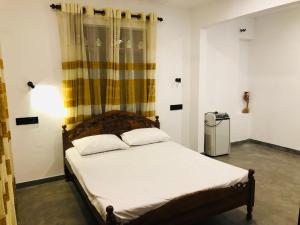 Ένα ή περισσότερα κρεβάτια σε δωμάτιο στο Villa Bilimbi