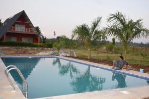 Πισίνα στο ή κοντά στο Golden Triangle River side Cabin