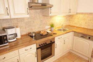 Kuchyň nebo kuchyňský kout v ubytování Wolfeicherhof + 15 fotografií