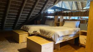 Postel nebo postele na pokoji v ubytování The Lazy Leopard Lodge + 22 fotografií