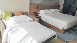 Aurea Central Hotel客房内的一张或多张床位