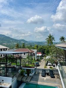 a view of a resort with a swimming pool at Supreme Siam Resort in Koh Samui 