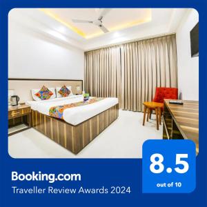 Postel nebo postele na pokoji v ubytování FabHotel Prime Sapphire Inn