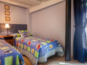 Postel nebo postele na pokoji v ubytování Apartaments La Clotxa - Prat de Comte