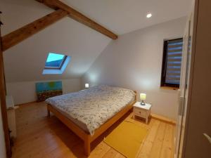Postel nebo postele na pokoji v ubytování Apartman Rujka