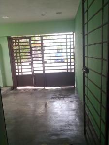 an empty room with a large door in a building at Hermosa Casa Vacacional MARINA in Playa del Carmen