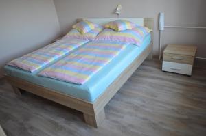 Posteľ alebo postele v izbe v ubytovaní Karolina Appartman