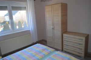 Posteľ alebo postele v izbe v ubytovaní Karolina Appartman