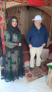 a man and a woman standing in a room at Queen House in Aswan