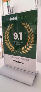 Ein Zertifikat, Auszeichnung, Logo oder anderes Dokument, das in der Unterkunft Villa Daita 1 ausgestellt ist