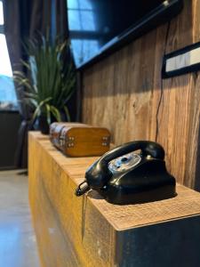 a black phone sitting on top of a table at White Castle - Charleroi Airport in Charleroi +49 photos