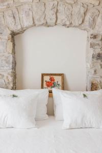 Krevet ili kreveti u jedinici u okviru objekta Apricus Locanda Boutique Hotel