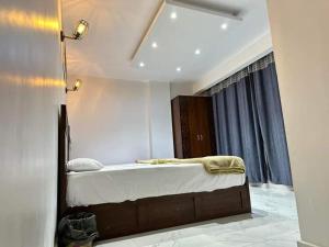 Postel nebo postele na pokoji v ubytování Khufu Pyramids Hotel + 36 fotografií