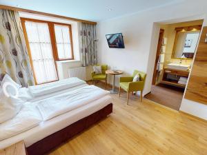 Krevet ili kreveti u jedinici u okviru objekta Hotel Gasthof Obermair