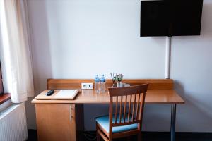 Televisi dan/atau pusat hiburan di Hotel Apollon