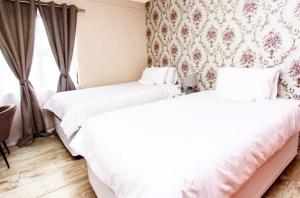 Ένα ή περισσότερα κρεβάτια σε δωμάτιο στο MorningSide Fortyfive