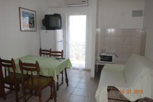 Kuchyň nebo kuchyňský kout v ubytování Apartments Mistral Orebic