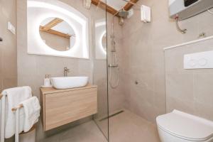 Koupelna v ubytování Mascheroni Luxury Rooms II + 26 fotografií