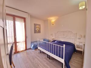 Postel nebo postele na pokoji v ubytování Residenza Cisanello