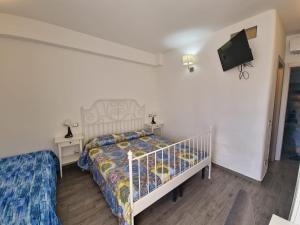 Postel nebo postele na pokoji v ubytování Residenza Cisanello + 5 fotografií