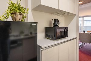Kuhinja ili čajna kuhinja u objektu Apartment Hotel 11 Shinsaibashi