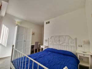 Postel nebo postele na pokoji v ubytování Residenza Cisanello