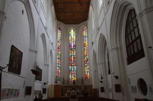 a church with a large stained glass window at Ferienwohnung "Am Vögenteich" in Rostock