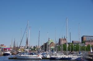 a bunch of boats are docked in a harbor at Ferienwohnung "Am Vögenteich" in Rostock