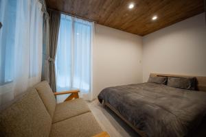Giường trong phòng chung tại ASPIRE【2min from Asahikawa sta】