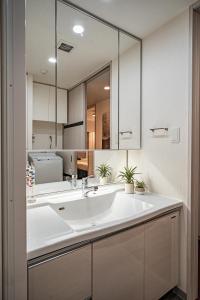 Kuhinja ili čajna kuhinja u objektu Apartment Hotel 11 Shinsaibashi