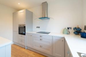 Кухня или кухненски бокс в Dingle Way Rest ,Luxury holiday home
