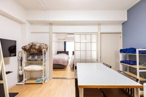 Двуетажно легло или двуетажни легла в стая в G&R House 202　Shinjuku room
