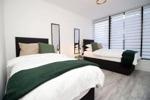 Ein Bett oder Betten in einem Zimmer der Unterkunft Contemporary Central Swindon 2BR, 3 beds - Parking