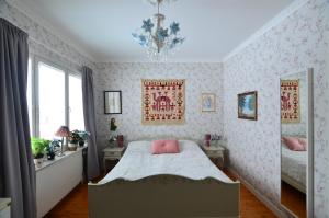 Postel nebo postele na pokoji v ubytování Villa Sisu