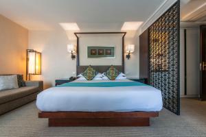 Postel nebo postele na pokoji v ubytování SSAW Boutique Hotel Hefei Intime Centre