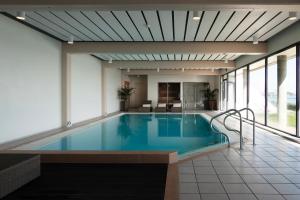Bazén v ubytování Helnan Marselis Hotel nebo v jeho okolí
