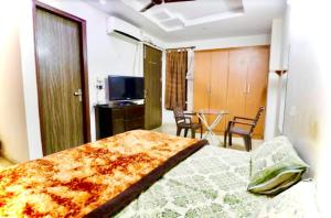 TV a/nebo společenská místnost v ubytování SSS Group Hotel, Dwarka, New Delhi