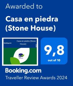 zrzut ekranu telefonu komórkowego z wiadomością anulowaną do csa en pica w obiekcie Casa en piedra (Stone House) w mieście Porriño