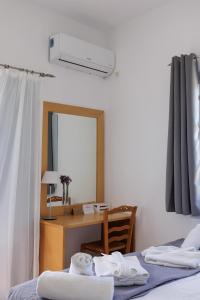 Posteľ alebo postele v izbe v ubytovaní Maryo Village
