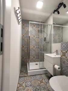 Ванная комната в Slate Apartament Polanica - Zdrój