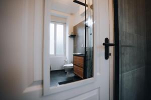 Ένα μπάνιο στο Le Sainte-Hélène • Le Modernisme en Cœur de Ville +29 φωτογραφίες