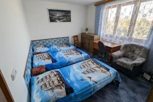 Ein Bett oder Betten in einem Zimmer der Unterkunft Vila Imagina