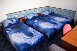 Ein Bett oder Betten in einem Zimmer der Unterkunft Vila Imagina