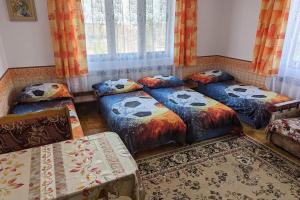 Ein Bett oder Betten in einem Zimmer der Unterkunft Vila Imagina