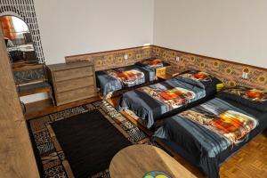 Ein Bett oder Betten in einem Zimmer der Unterkunft Vila Imagina
